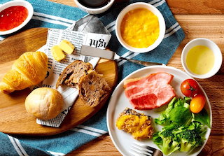 Breakfast plate, herb cheese salmon, scrambled egg, bacon, bread