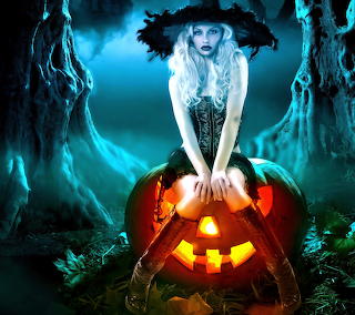 witch halloween girl on pumpkin