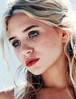 Mary-Kate or Ashley Olsen
